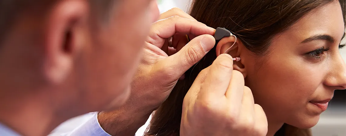 do hearing aids cause ear wax buildup quickly